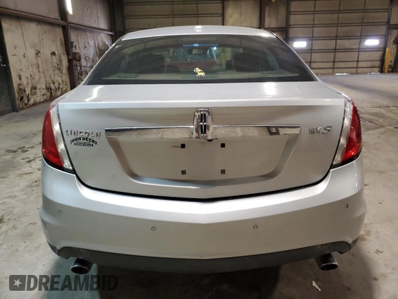 2009 Lincoln MKS z VIN 1LNHM93R89G613358, wystawiony jako Copart lot #60170065 z przebiegiem 171 803 mil mil oraz Czysty tytuł • Clean title. Historia ofert i sprzedaży dostępna na DreamBid. Obrazek 6.