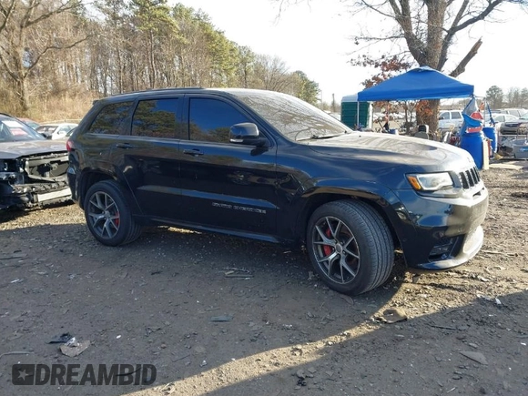 2017 Jeep Grand Cherokee SRT with VIN 1C4RJFDJ3HC694736, listed as a IAAI auction lot 41292771 with 79,966 mi miles. Bid and sale history available at carsss.com. Image 1.