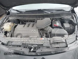 2014 Mazda CX-9 Sport with VIN JM3TB3BV8E0437180, listed as a IAAI auction lot 42413844 with 177,393 mi miles and . Bid and sale history available at DreamBid. Image 10.