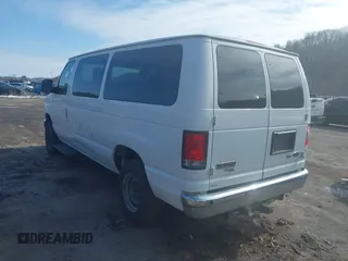 2014 Ford Econoline Passenger XL with VIN 1FBNE3BL2EDB06549, listed as a IAAI auction lot 41599964 with 197,921 mi miles. Bid and sale history available at carsss.com. Image 3.
