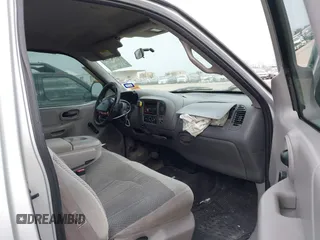 1999 Ford F-150 with VIN 1FTZX1720XKA10512, listed as a IAAI auction lot 41247083 with 169,154 mi miles and . Bid and sale history available at DreamBid. Image 5.