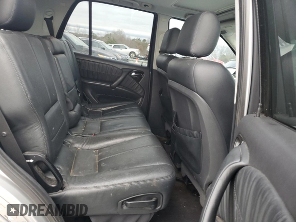 2005 Mercedes-Benz M 500 z VIN 4JGAB75E35A532559, wystawiony jako Copart lot #85321484 z przebiegiem 305 999 mil mil oraz Szkoda całkowita • Salvage title. Historia ofert i sprzedaży dostępna na DreamBid. Obrazek 12.