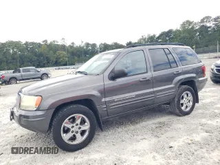 2004 Jeep Grand Cherokee Limited with VIN 1J8GX58N24C333403, listed as a Copart auction lot 73708764 with 145,471 mi miles and Salvage Title. Bid and sale history available at DreamBid. Image 1.