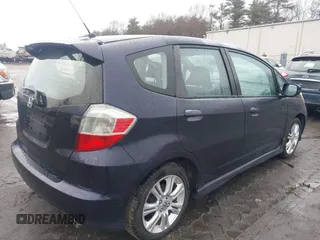 2009 Honda Fit Sport with VIN JHMGE88419S069110, listed as a IAAI auction lot 41981489 with 113,724 mi miles. Bid and sale history available at carsss.com. Image 4.