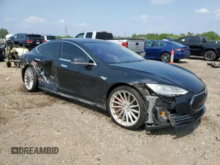 2014 Tesla Model S 60 with VIN 5YJSA1H11EFP36611, listed as a Copart auction lot 59544085 with 97,214 mi miles and Salvage title. Bid and sale history available at DreamBid. Image 4.