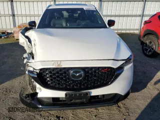 2022 Mazda CX-5 2.5 Turbo with VIN JM3KFBAY7N0597010, listed as a Copart auction lot 83062114 with 18,136 mi miles and Salvage Title. Bid and sale history available at carsss.com. Image 5.