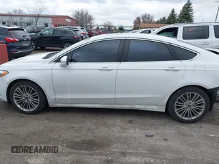 2015 Ford Fusion SE with VIN 3FA6P0H9XFR181132, listed as a IAAI auction lot 41075635 with 216,089 mi miles and . Bid and sale history available at DreamBid. Image 15.