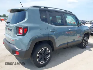 2015 Jeep Renegade Trailhawk with VIN ZACCJBCT8FPB33586, listed as a IAAI auction lot 42590207 with 127,168 mi miles and . Bid and sale history available at DreamBid. Image 4.