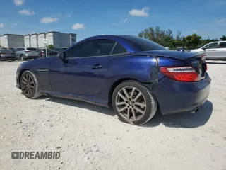 2013 Mercedes-Benz SLK 250 with VIN WDDPK4HA1DF055417, listed as a Copart auction lot 62498335 with 74,296 mi miles and Salvage title. Bid and sale history available at DreamBid. Image 2.