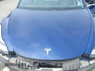 2020 Tesla Model 3 Standard Range Plus z VIN 5YJ3E1EA8LF785010, wystawiony jako IAAI lot #42130951 z przebiegiem 90 072 mil mil oraz . Historia ofert i sprzedaży dostępna na DreamBid. Obrazek 10.