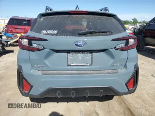 2024 Subaru Crosstrek Premium с VIN JF2GUADC4R8269602, выставлен на аукционе Copart как лот 56392305 с пробегом 23 011 миль миль и Списание • Salvage title. История ставок и продаж доступна на DreamBid. Изображение 6.