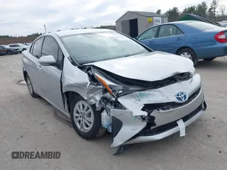 2016 Toyota Prius Two with VIN JTDKBRFUXG3023523, listed as a IAAI auction lot 41757143 with 124,144 mi miles. Bid and sale history available at carsss.com. Image 6.