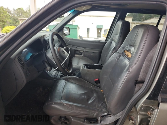 1999 Mercury Mountaineer with VIN 4M2ZU52P9XUJ13428, listed as a Copart auction lot 70789964 with 191,042 mi miles and Salvage title. Bid and sale history available at DreamBid. Image 7.