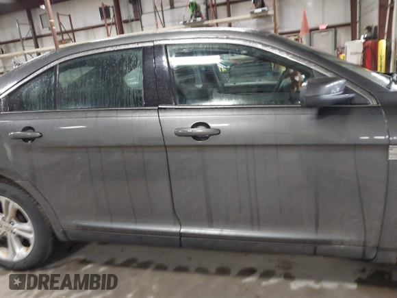 2015 Ford Taurus SEL with VIN 1FAHP2E87FG207029, listed as a IAAI auction lot 41752890 with 119,858 mi miles and . Bid and sale history available at carsss.com. Image 13.
