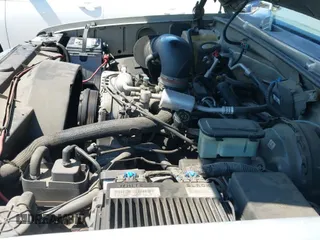 1999 Chevrolet Suburban with VIN 1GNFK16R0XJ560144, listed as a IAAI auction lot 43267797 with 232,125 mi miles and . Bid and sale history available at DreamBid. Image 12.