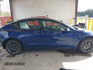 2022 Tesla Model 3 Long Range with VIN 5YJ3E1EB3NF267365, listed as a IAAI auction lot 41996594 with 32,687 mi miles and . Bid and sale history available at DreamBid. Image 14.