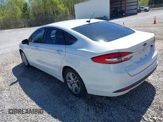 2018 Ford Fusion SE z VIN 3FA6P0H77JR142828, wystawiony jako IAAI lot #41820649 z przebiegiem 208 517 mil mil oraz . Historia ofert i sprzedaży dostępna na DreamBid. Obrazek 3.