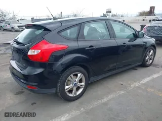 2014 Ford Focus SE with VIN 1FADP3K27EL199542, listed as a IAAI auction lot 42071908 with 142,180 mi miles. Bid and sale history available at carsss.com. Image 4.