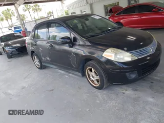 2009 Nissan Versa 1.8 S with VIN 3N1BC11E79L368680, listed as a IAAI auction lot 42090230 with 190,049 mi miles. Bid and sale history available at carsss.com. Image 1.