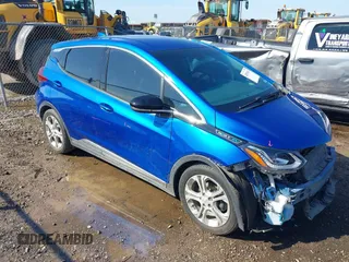 2021 Chevrolet Bolt EV LT z VIN 1G1FY6S05M4100363, wystawiony jako IAAI lot #42091631 z przebiegiem 26 812 mil mil oraz . Historia ofert i sprzedaży dostępna na DreamBid. Obrazek 1.
