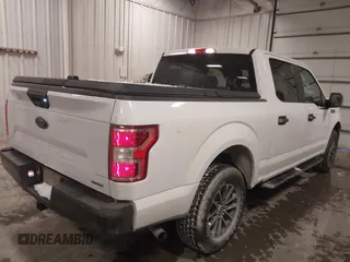 2020 Ford F-150 z VIN 1FTEW1P4XLKE66465, wystawiony jako IAAI lot #41579084 z przebiegiem 126 704 mil mil oraz . Historia ofert i sprzedaży dostępna na DreamBid. Obrazek 4.