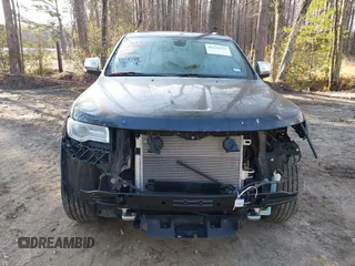 2015 Jeep Grand Cherokee Overland with VIN 1C4RJECGXFC957530, listed as a IAAI auction lot 41633522 with 168,258 mi miles and . Bid and sale history available at DreamBid. Image 12.