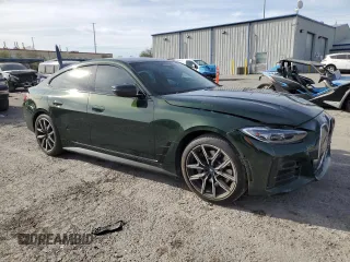 2024 BMW i4 eDrive40 with VIN WBY73AW06RFS32808, listed as a Copart auction lot 85585424 with 15,669 mi miles and Salvage Title. Bid and sale history available at carsss.com. Image 4.