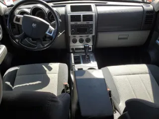 2007 Dodge Nitro SLT z VIN 1D8GU58K07W723331, wystawiony jako Copart lot #55169295 z przebiegiem 242 670 mil mil oraz Czysty tytuł • Clean title. Historia ofert i sprzedaży dostępna na DreamBid. Obrazek 8.