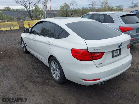 2014 BMW 3 Series Gran Turismo 328i xDrive with VIN WBA3X5C5XED559713, listed as a IAAI auction lot 42078622 with 68,233 mi miles. Bid and sale history available at carsss.com. Image 3.