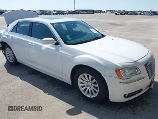 2013 Chrysler 300 with VIN 2C3CCAAG1DH707703, listed as a IAAI auction lot 42463723 with 166,580 mi miles and . Bid and sale history available at DreamBid. Image 1.