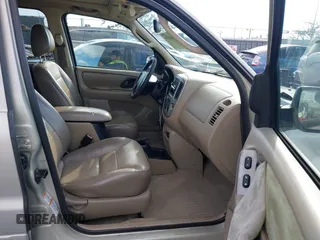2004 Ford Escape Limited z VIN 1FMCU04104KA41934, wystawiony jako IAAI lot #41444706 z przebiegiem 169 347 mil mil oraz . Historia ofert i sprzedaży dostępna na DreamBid. Obrazek 5.