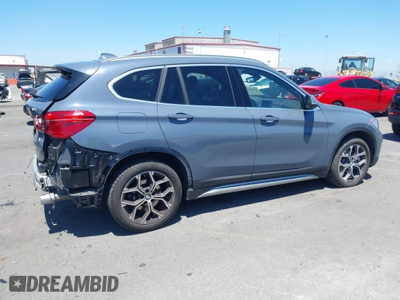 2021 BMW X1 sDrive28i z VIN WBXJG7C02M5T37169, wystawiony jako IAAI lot #42226396 z przebiegiem 48 603 mil mil oraz . Historia ofert i sprzedaży dostępna na DreamBid. Obrazek 14.