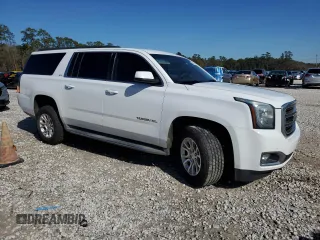 2015 GMC Yukon XL SLT with VIN 1GKS1HKC5FR255473, listed as a Copart auction lot 88680595 with 198,265 mi miles and Salvage Title. Bid and sale history available at carsss.com. Image 4.