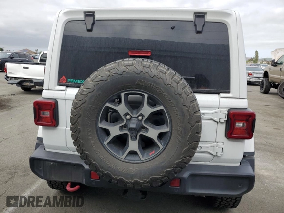 2019 Jeep Wrangler Unlimited Rubicon with VIN 1C4HJXFG6KW642011, listed as a Copart auction lot 53132185 with 67,435 mi miles and Salvage title. Bid and sale history available at DreamBid. Image 6.