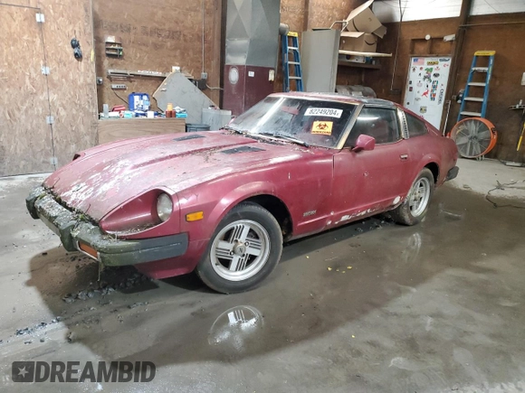 1981 Datsun 280ZX z VIN JN1HZ04S1BX414616, wystawiony jako Copart lot #82249204 z przebiegiem 114 028 mil mil oraz Tytuł czysty. Historia ofert i sprzedaży dostępna na DreamBid. Obrazek 1.