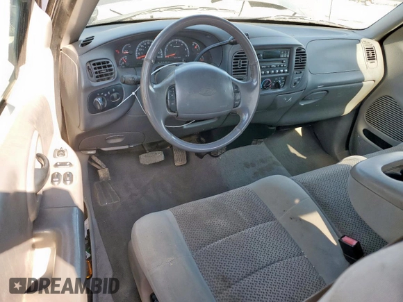 2002 Ford F-150 XL with VIN 1FTPX18L32NB65156, listed as a Copart auction lot 61418955 with 176,622 mi miles and Salvage title. Bid and sale history available at DreamBid. Image 8.