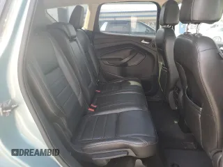 2013 Ford Escape SEL z VIN 1FMCU9H98DUC56048, wystawiony jako Copart lot #61613085 z przebiegiem 198 102 mil mil oraz Szkoda całkowita • Salvage title. Historia ofert i sprzedaży dostępna na DreamBid. Obrazek 11.