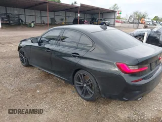2019 BMW 3 Series 330i with VIN WBA5R1C51KAE82094, listed as a IAAI auction lot 39040815 with 66,344 mi miles and . Bid and sale history available at DreamBid. Image 3.