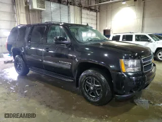 2012 Chevrolet Suburban LT with VIN 1GNSKJE7XCR327124, listed as a Copart auction lot 51016235 with 241,689 mi miles and Clean Title. Bid and sale history available at carsss.com. Image 4.