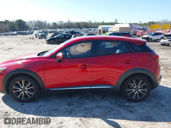 2016 Mazda CX-3 Grand Touring with VIN JM1DKFD72G0129096, listed as a IAAI auction lot 41592893 with 144,860 mi miles. Bid and sale history available at carsss.com. Image 13.
