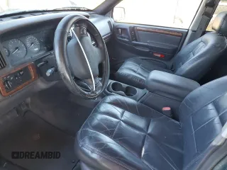 1998 Jeep Grand Cherokee Limited with VIN 1J4GZ78Y8WC261353, listed as a Copart auction lot 76605944 with 156,883 mi miles and Salvage Title. Bid and sale history available at carsss.com. Image 7.