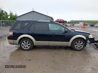 2008 Ford Taurus X Eddie Bauer z VIN 1FMDK08W58GA18903, wystawiony jako IAAI lot #42552380 z przebiegiem 164 633 mil mil oraz . Historia ofert i sprzedaży dostępna na DreamBid. Obrazek 14.