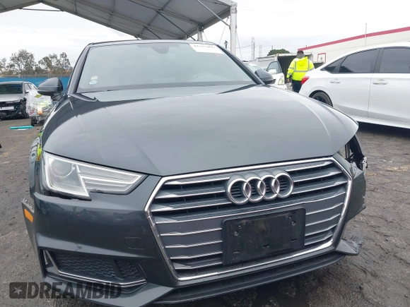 2019 Audi A4 Premium z VIN WAUGMAF44KA060327, wystawiony jako IAAI lot #41757099 z przebiegiem 52 110 mil mil oraz . Historia ofert i sprzedaży dostępna na DreamBid. Obrazek 13.