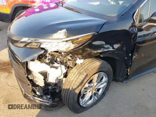 2024 Toyota Sienna XLE with VIN 5TDJSKFC9RS152848, listed as a IAAI auction lot 41290455 with 1,967 mi miles and . Bid and sale history available at DreamBid. Image 6.