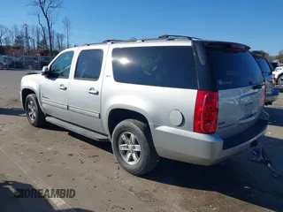 2011 GMC Yukon XL SLT z VIN 1GKS1KE05BR386637, wystawiony jako IAAI lot #41648997 z przebiegiem 162 262 mil mil oraz . Historia ofert i sprzedaży dostępna na DreamBid. Obrazek 3.