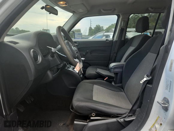 2014 Jeep Patriot Sport with VIN 1C4NJPBA9ED714971, listed as a Copart auction lot 63425455 with 117,406 mi miles and Clean title. Bid and sale history available at DreamBid. Image 7.