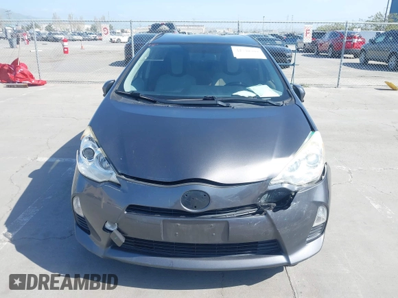 2014 Toyota Prius One with VIN JTDKDTB33E1061088, listed as a IAAI auction lot 42040762 with 206,735 mi miles and . Bid and sale history available at DreamBid. Image 6.