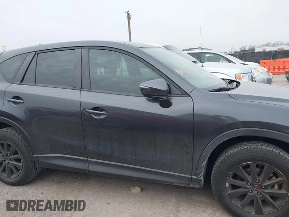 2016 Mazda CX-5 Sport with VIN JM3KE2BY4G0858100, listed as a IAAI auction lot 41368135 with 93,435 mi miles. Bid and sale history available at carsss.com. Image 13.