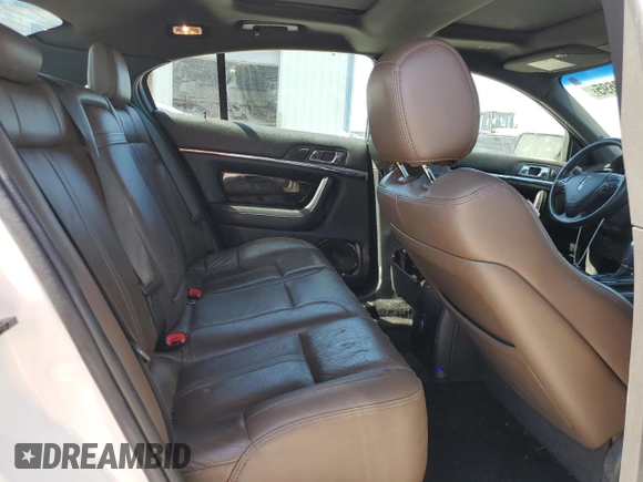 2015 Lincoln MKS с VIN 1LNHL9DK7FG605218, выставлен на аукционе Copart как лот 50882695 с пробегом 160 907 миль миль и Списание • Salvage title. История ставок и продаж доступна на DreamBid. Изображение 11.