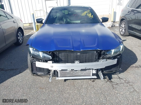 2025 BMW M3 Competition xDrive with VIN WBS33HJ05SFT74162, listed as a IAAI auction lot 41609207 with 2,912 mi miles. Bid and sale history available at carsss.com. Image 6.